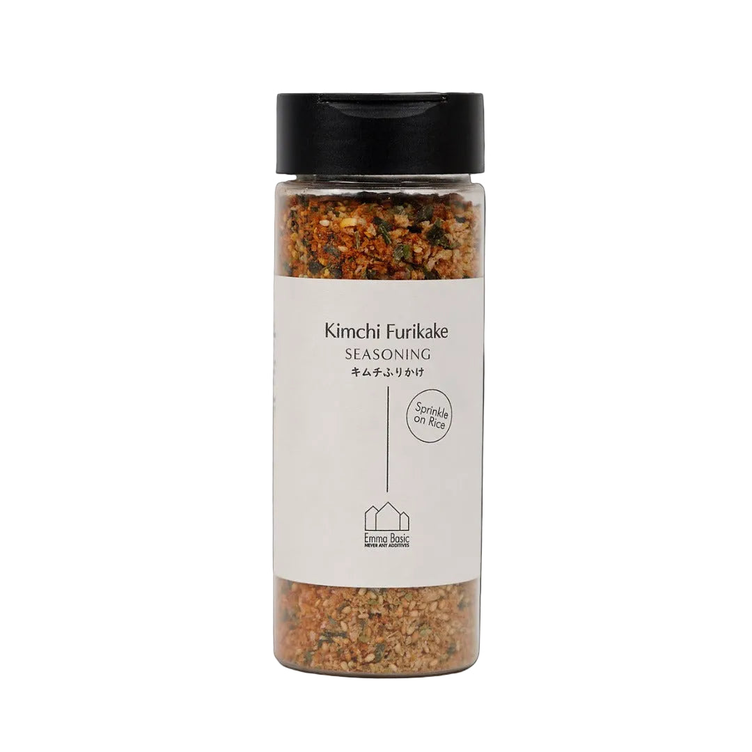 Bottle of Kimchi Furikake seasoning with a black lid on a white background