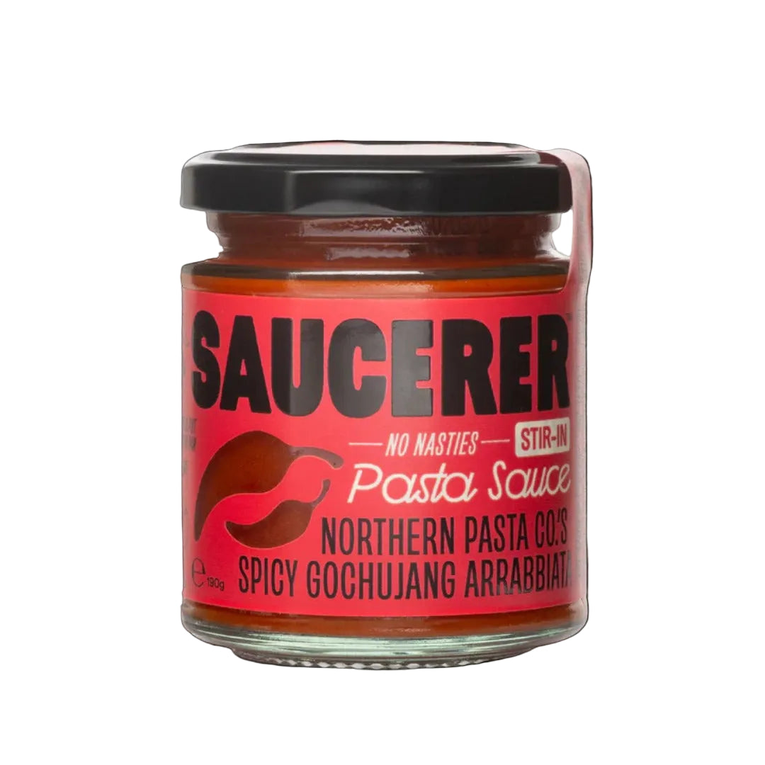 Jar of pasta sauce with a red label on a black background
