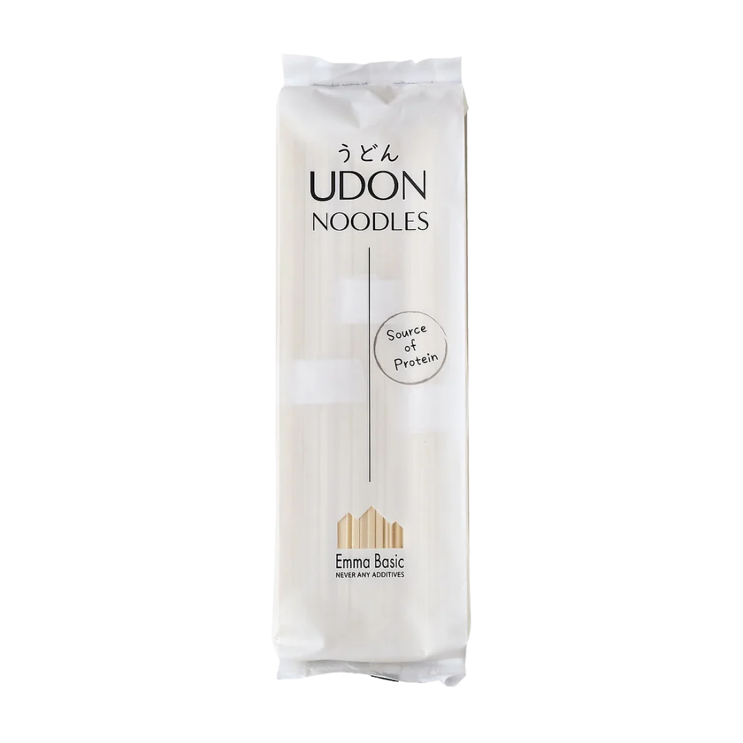 A package of Udon Noodles, Emma Basic variety, shown vertically against a plain white background. The packaging is white with black text and a small gold logo at the bottom.