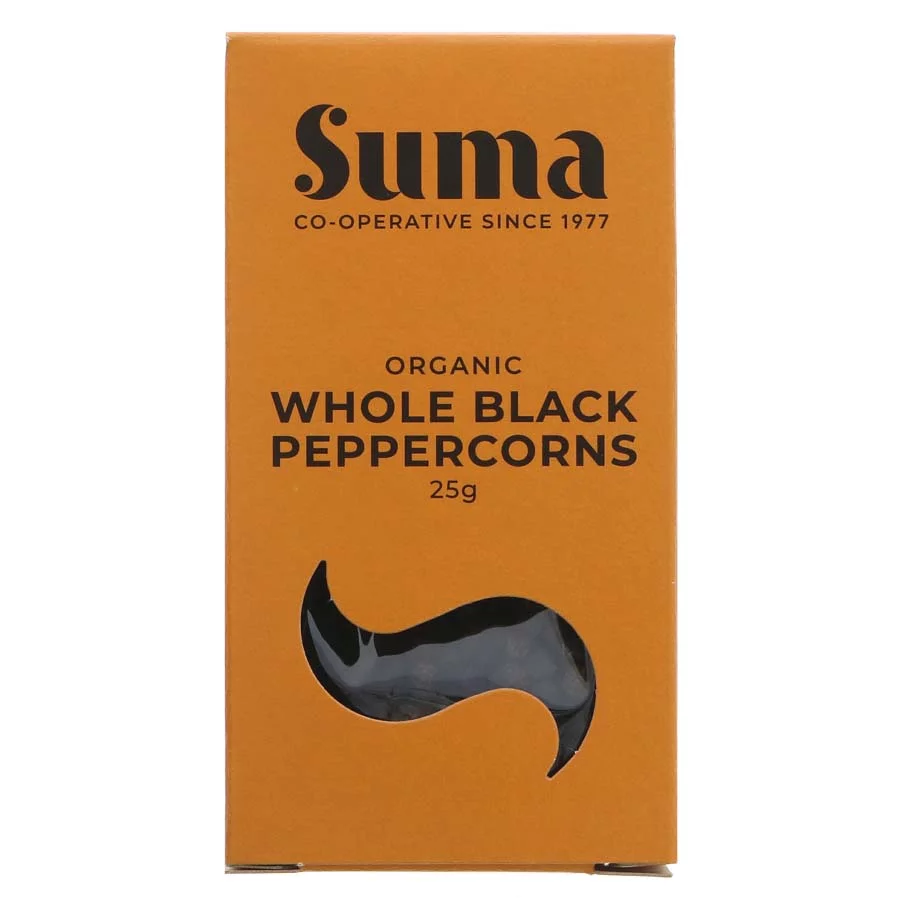 Suma Whole black peppercorns on a white background 