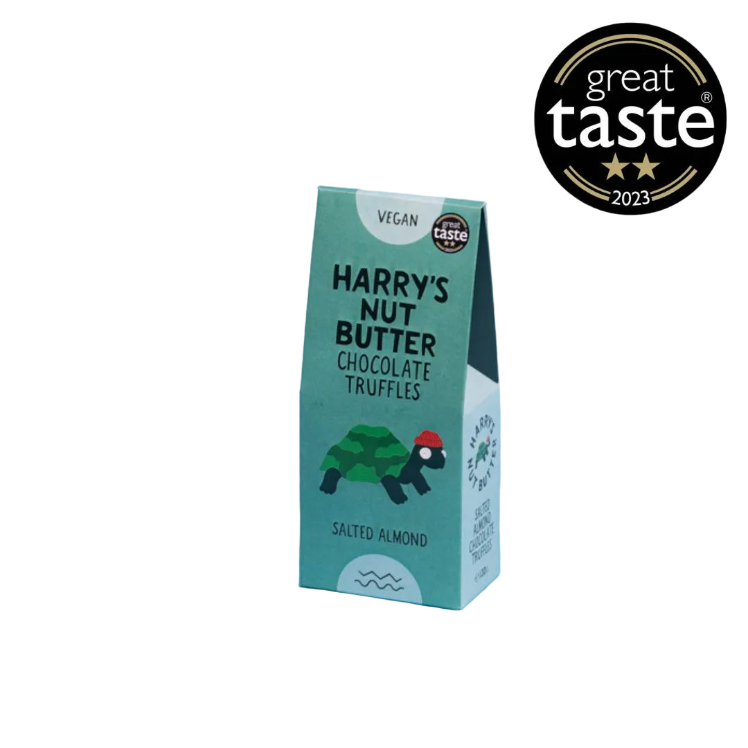 Close-up of Harry's Nut Butter Chocolate and salted almond truffles on a white background 