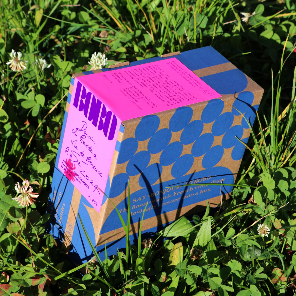 Domaine La Providence Coteaux d’Aix en Provence Rosé 2024 Natural & Biodynamic in a 2.25L bag in box in the grass at night.