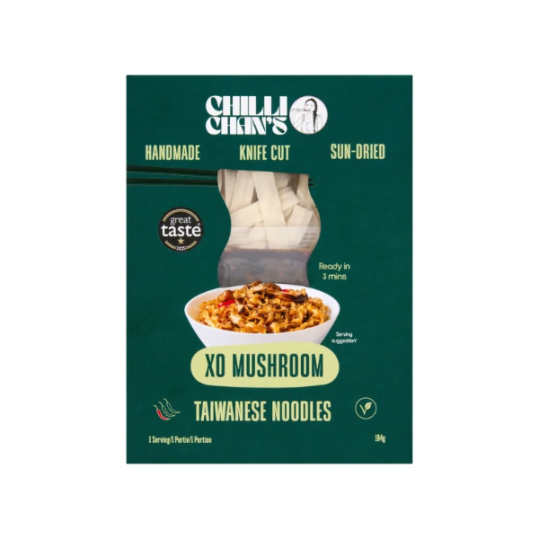Chilli Chan's XO Mushroom Taiwanese Noodles packaging in a dark green box, featuring a photo of the knife-cut dried noodles and a bowl of prepared noodle dish.