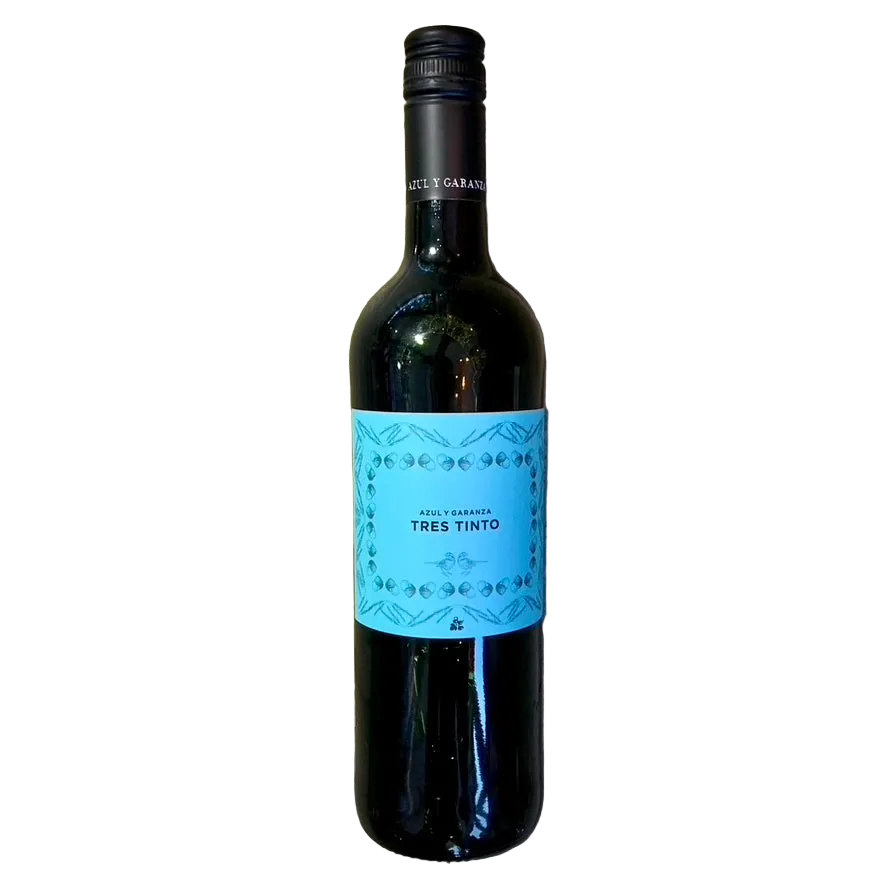 Wine bottle with a blue label on a textured surface