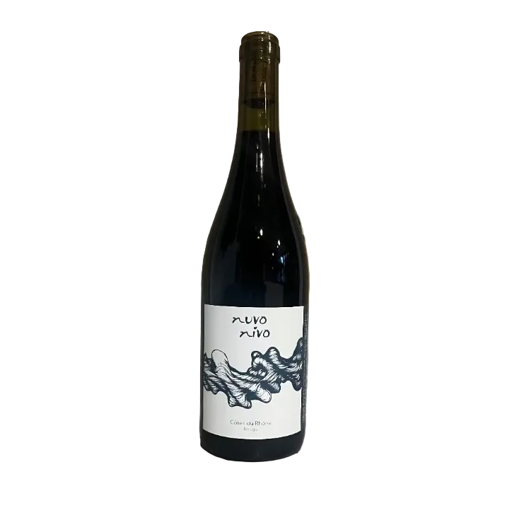 Wine bottle with a label on a concrete surface
