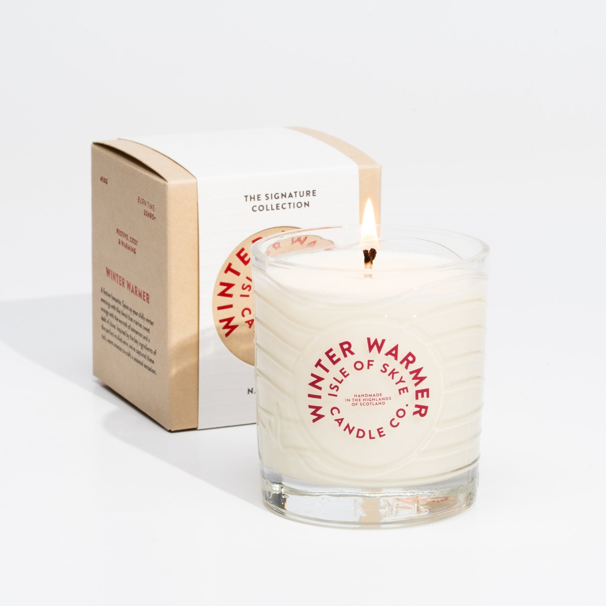Close-up of Isle of Skye Winter Warmer Island Natural Wax Candle on a white background 