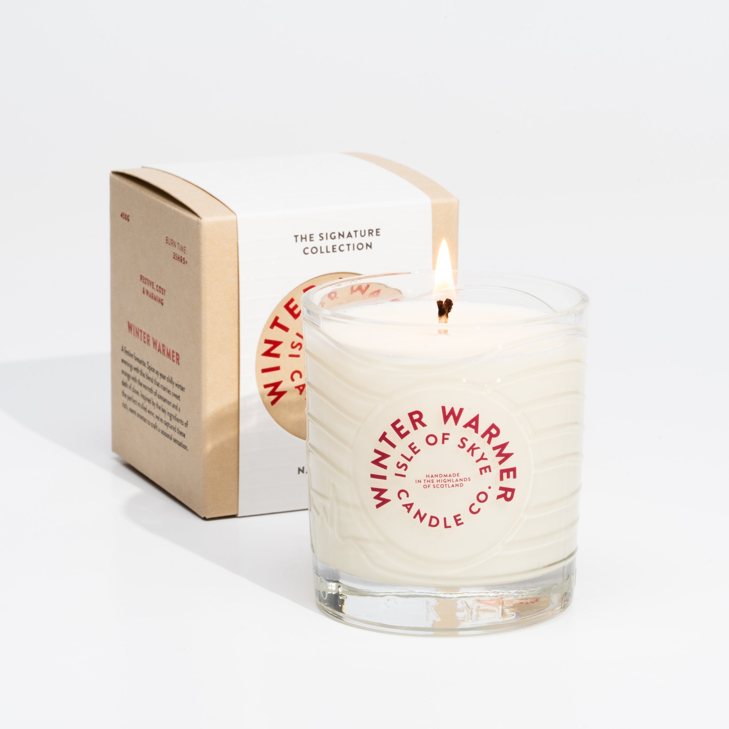 Close-up of Isle of Skye Winter Warmer Island Natural Wax Candle on a white background 