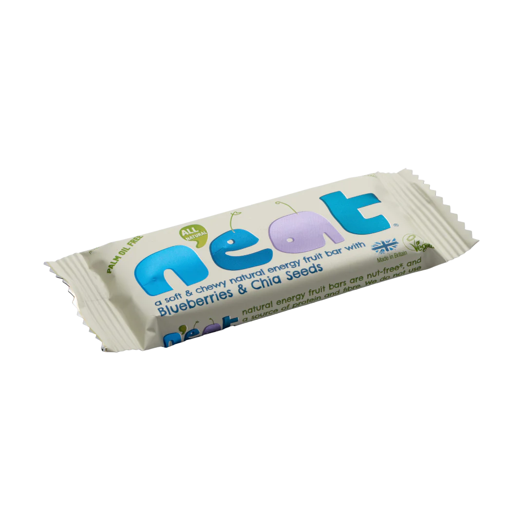 Neat fruit bar packaging with blueberries and chia seeds on a white background