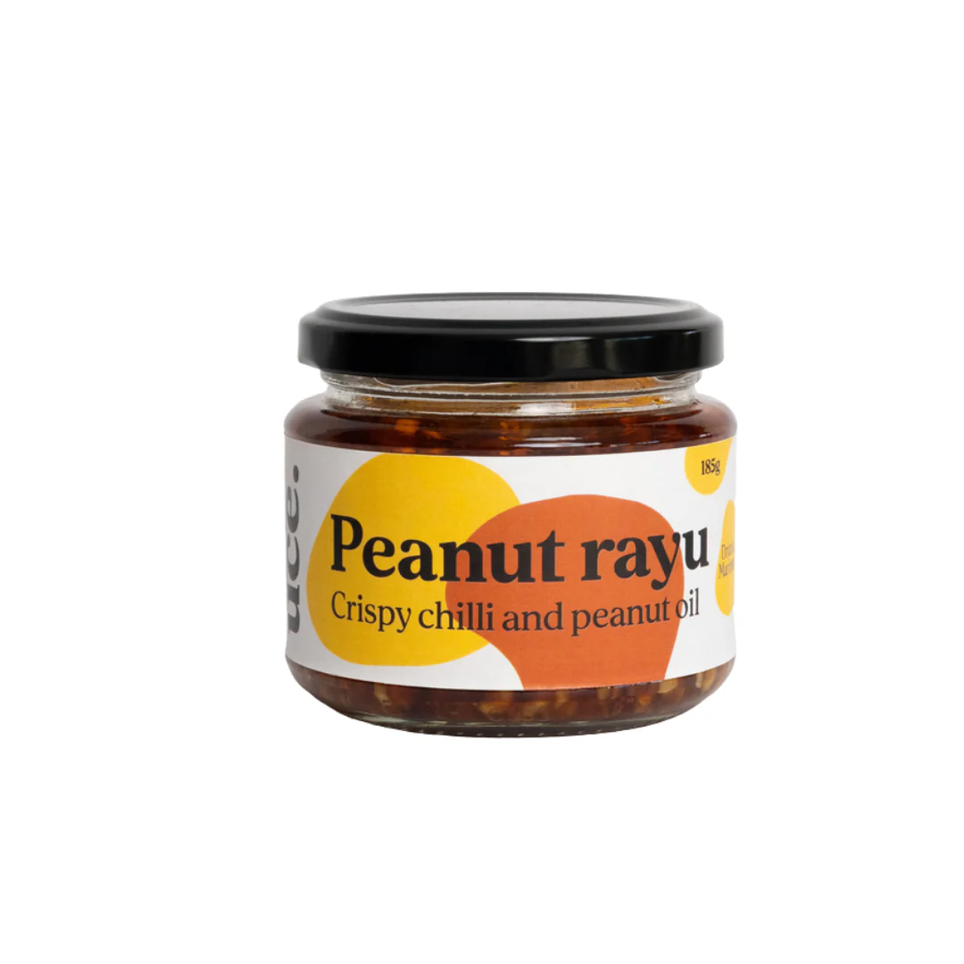 Jar of Peanut Rayu with a colorful label on a white background