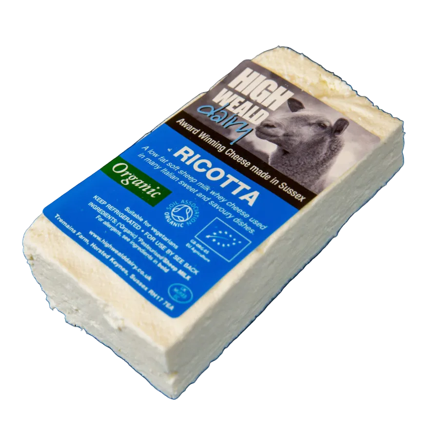 A block of High Weir Organic Ricotta cheese with its blue and white label, photographed on a white background